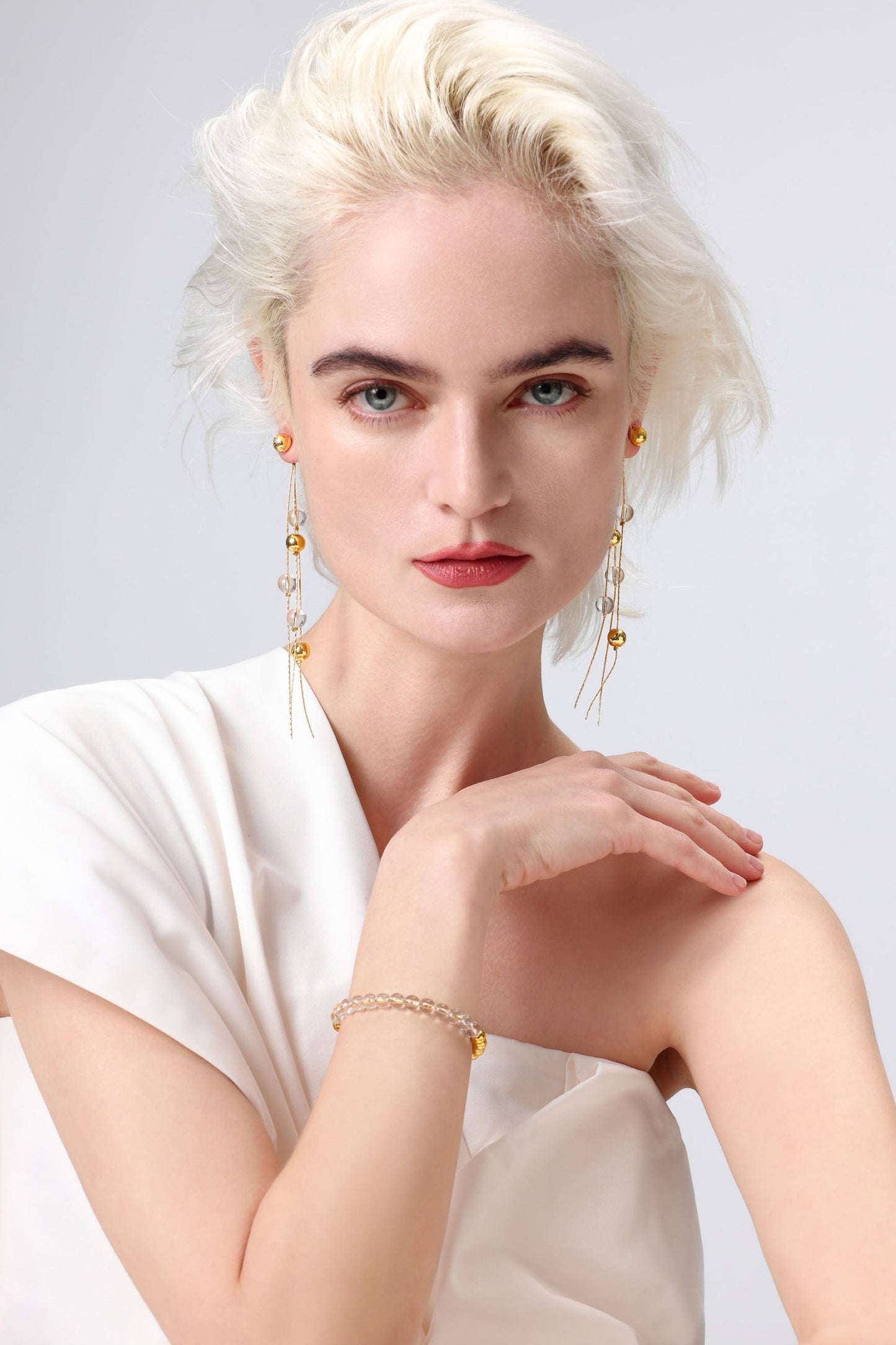 FrostLily Clear Crystal and Gold Bead Drop Earrings