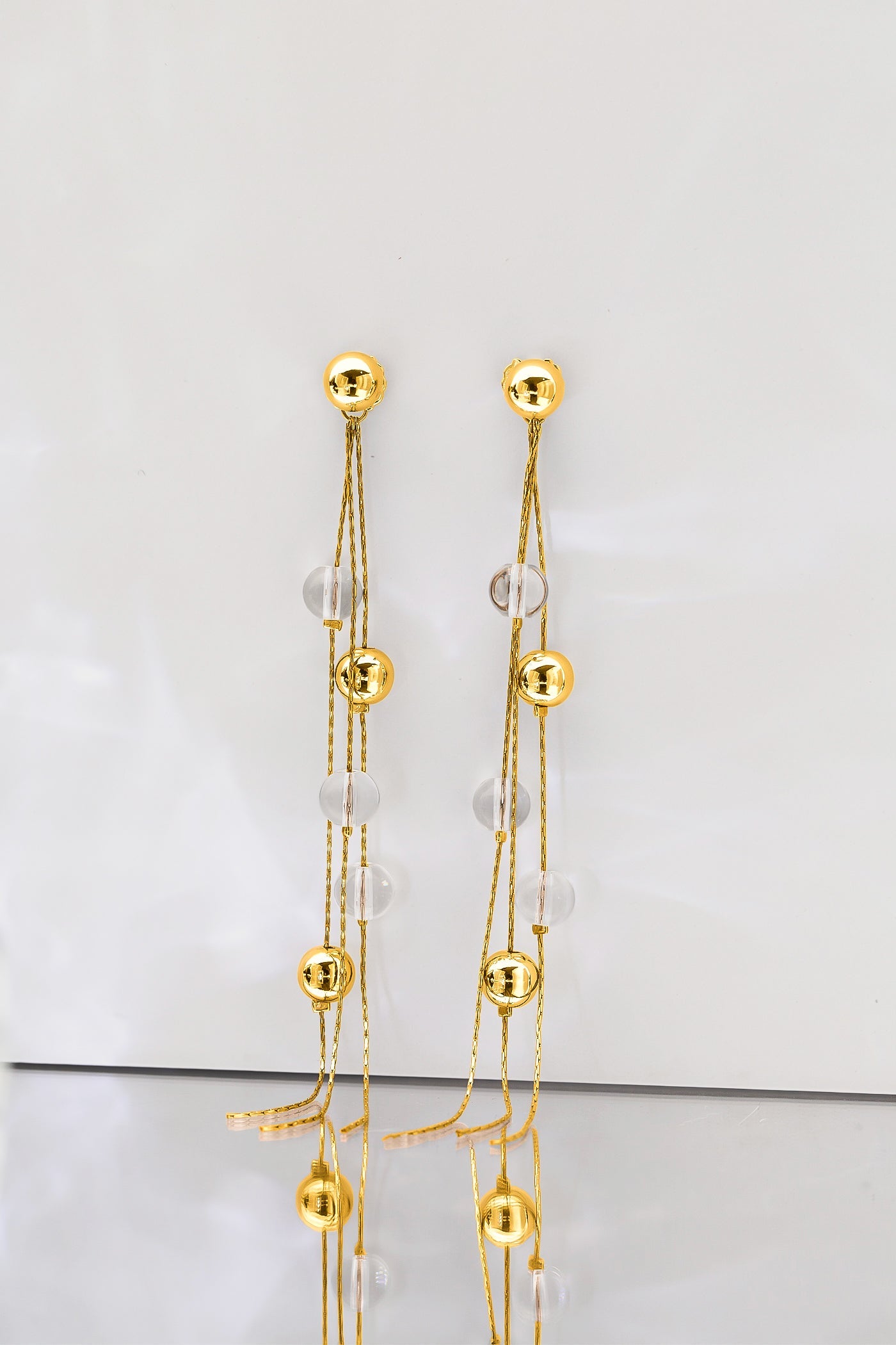 FrostLily Clear Crystal and Gold Bead Drop Earrings